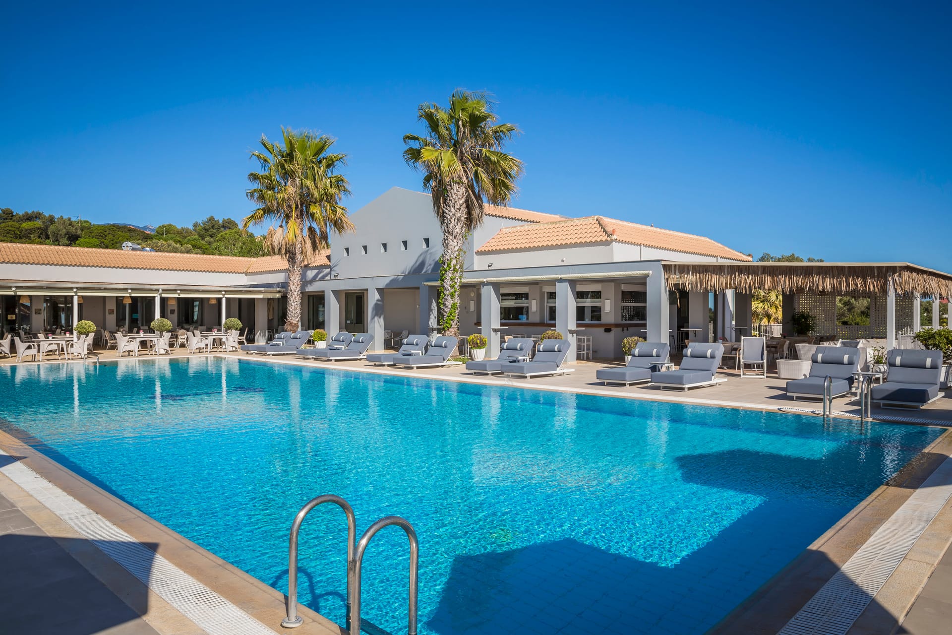 Astra Village Hotel & Suites